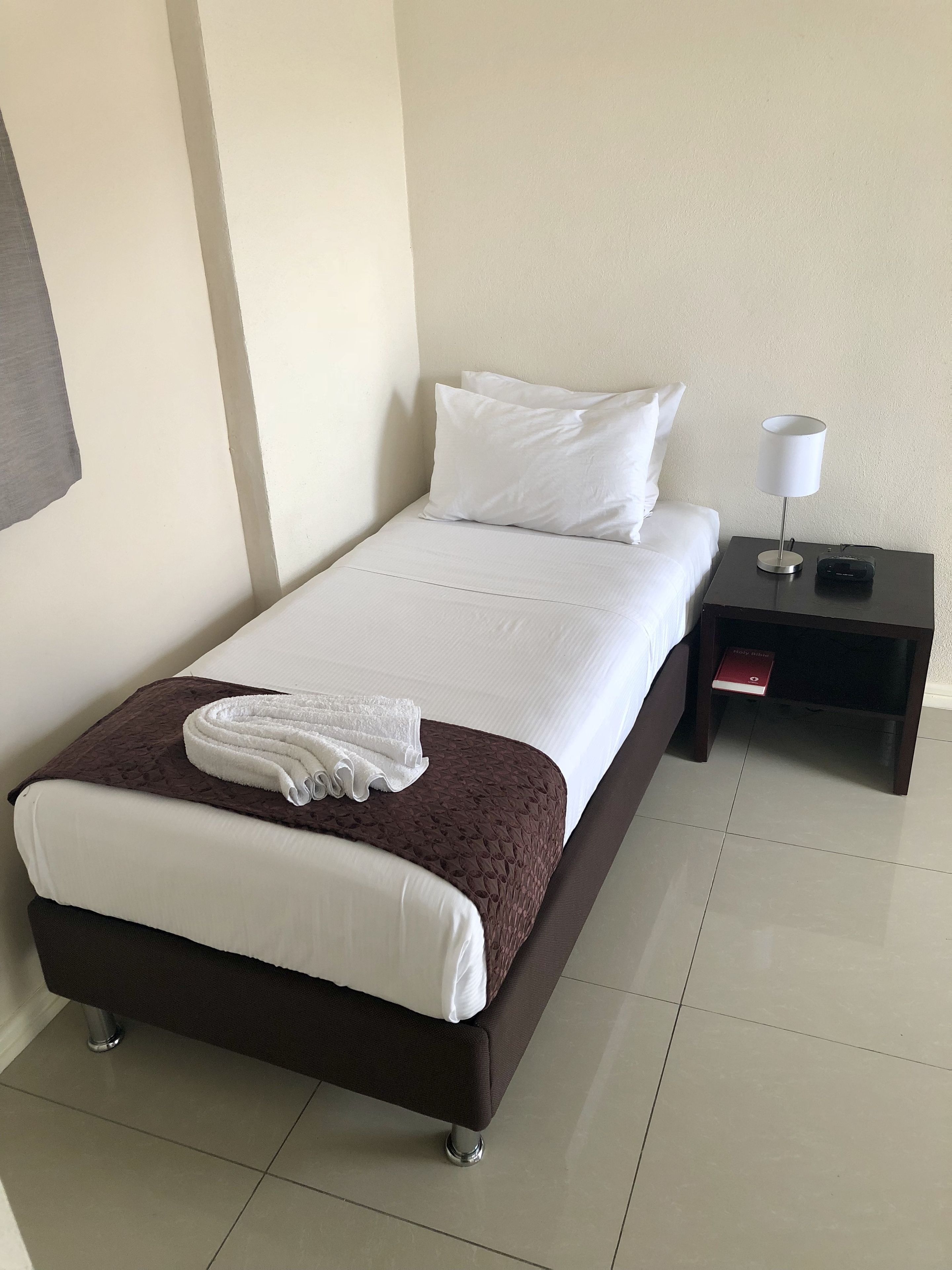 standard triple room | blackout curtains, bed sheets