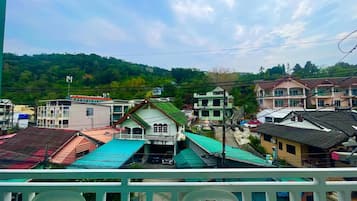 Deluxe Studio, 1 Bedroom, Non Smoking, Balcony | Living area | Flat-screen TV