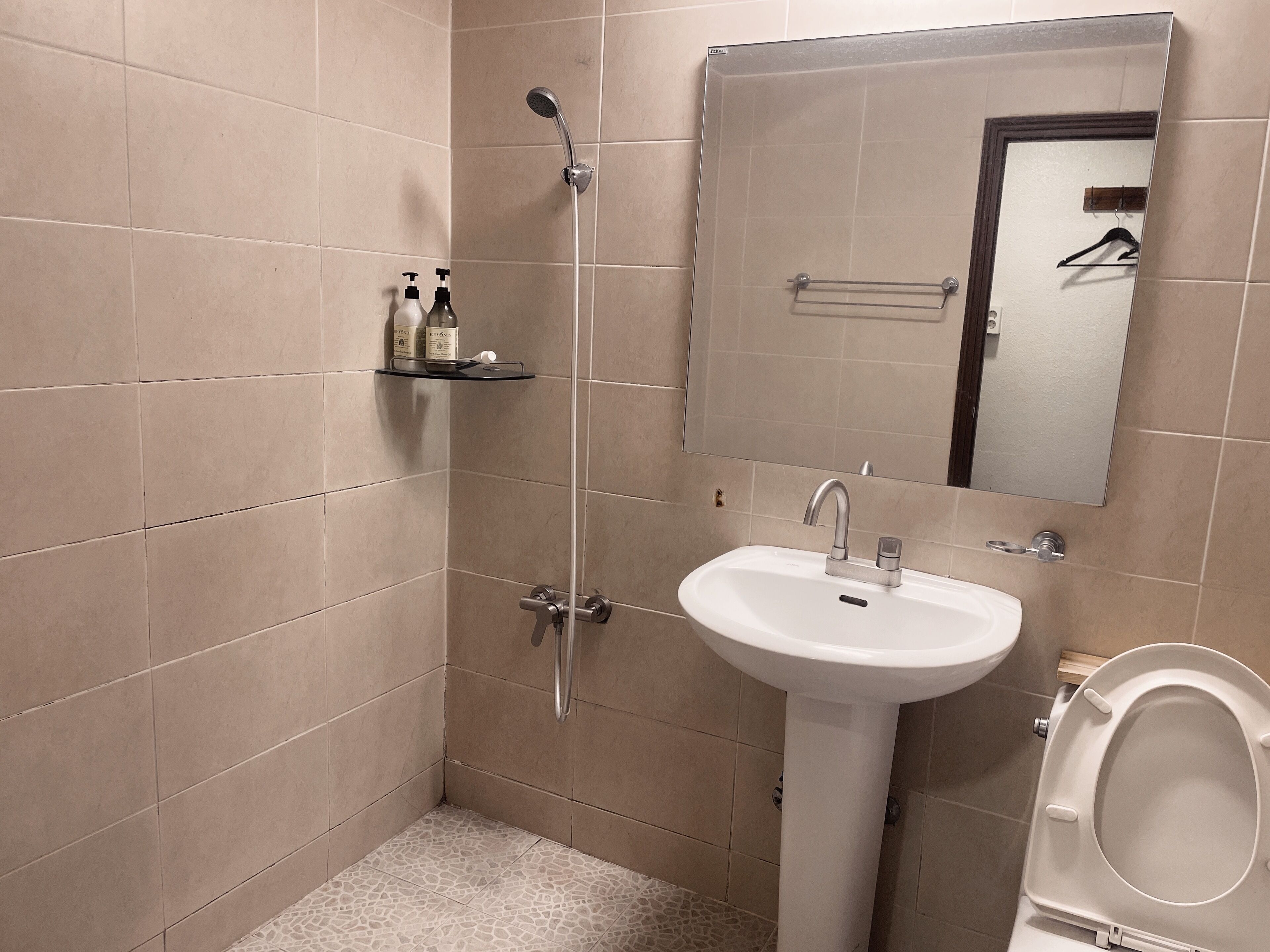 Shower, free toiletries, hair dryer, slippers
