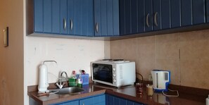 Maison majestueuse, 2 chambres, vue sur la plage | Cuisine privée | Réfrigérateur grande capacité avec congélateur, un four
