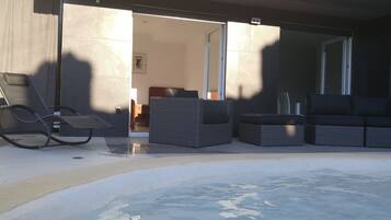 One-Bedroom Apartment with Pool View | Down comforters, memory foam beds, individually decorated