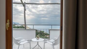 Quarto casal superior, vista para o mar | Terraço/pátio