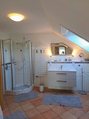 Bathtub, hair dryer, towels