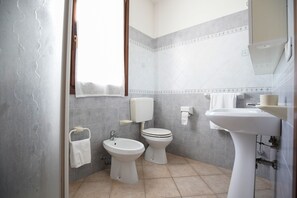 Shower, rainfall showerhead, slippers, bidet
