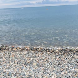 On the beach, black sand