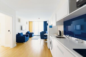 Panorama Two Bedrooms plus Living Room | Living area | LCD TV, first-run movies