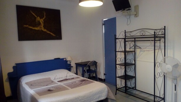 Standard Quadruple Room | Desk, iron/ironing board (on request), cribs (free), WiFi (free)