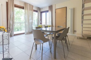 Apartment, 3 Bedrooms, 2 Bathrooms | Living area | Flat-screen TV - Tasso Apartments (Comacchio)