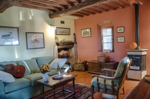 House, 3 Bedrooms, Garden View (Le Tortore) | Living room | Fireplace - Agriturismo Fattoria La Prugnola (Montescudaio)