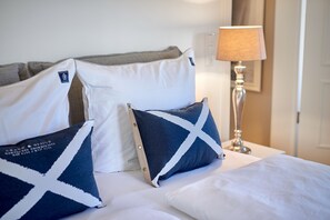 Egyptian cotton sheets, premium bedding, down duvets, in-room safe