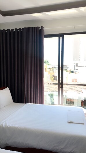 VIP Balcony Room | Minibar, blackout drapes, free WiFi, bed sheets - Nam Phuong Hotel (Nha Trang)