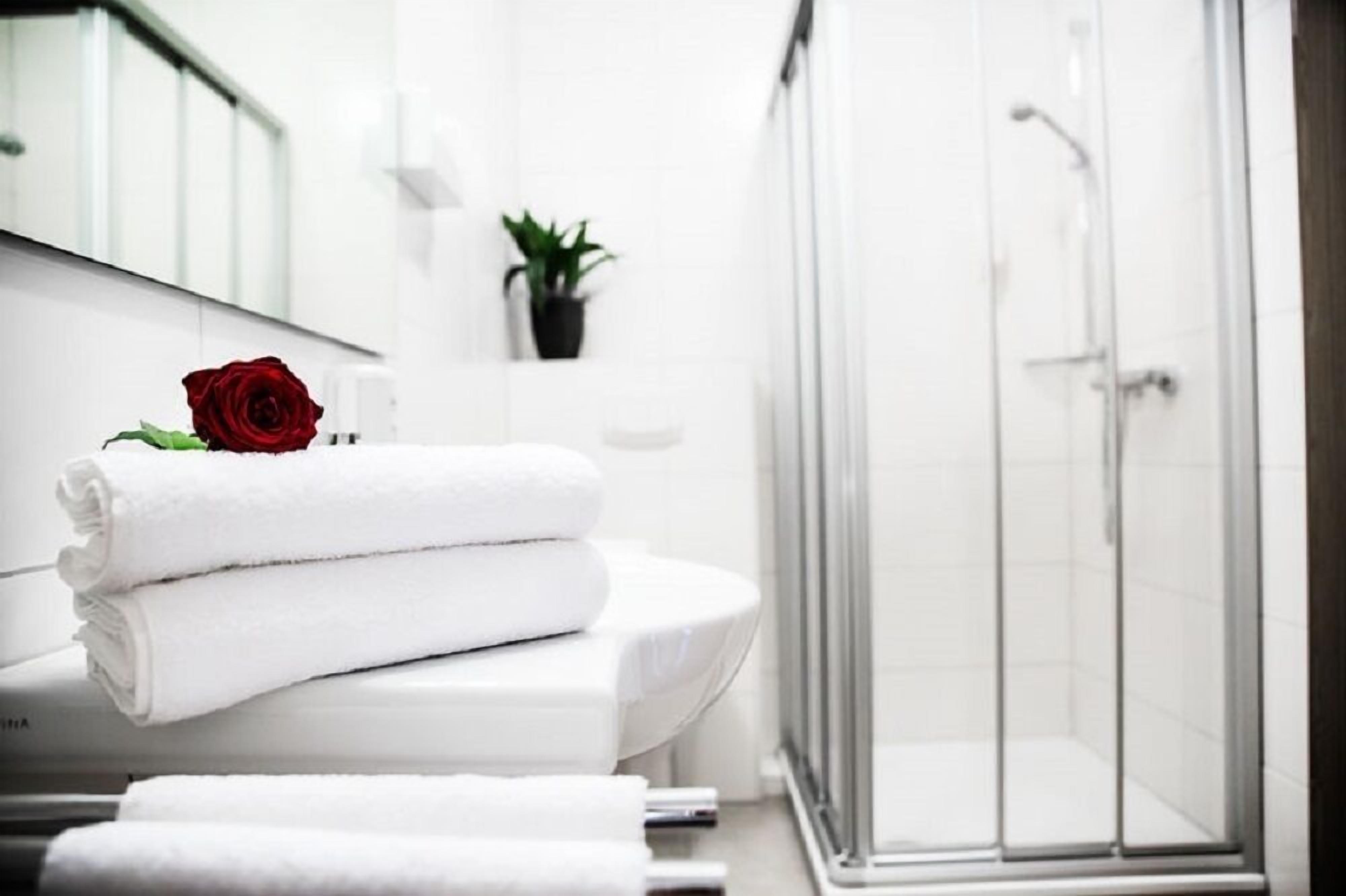 shower, free toiletries, hair dryer, towels