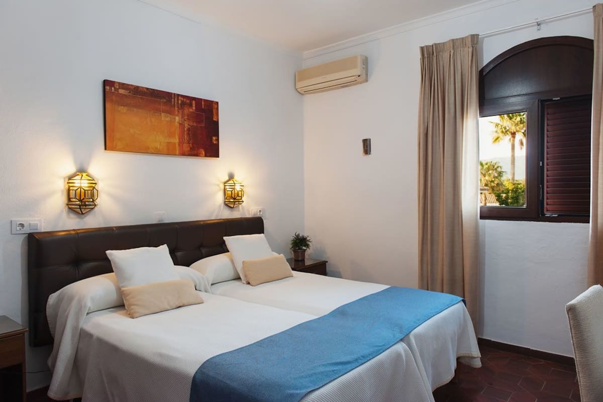 Habitación individual | Minibar, cunas gratuitas, camas supletorias y wifi gratis