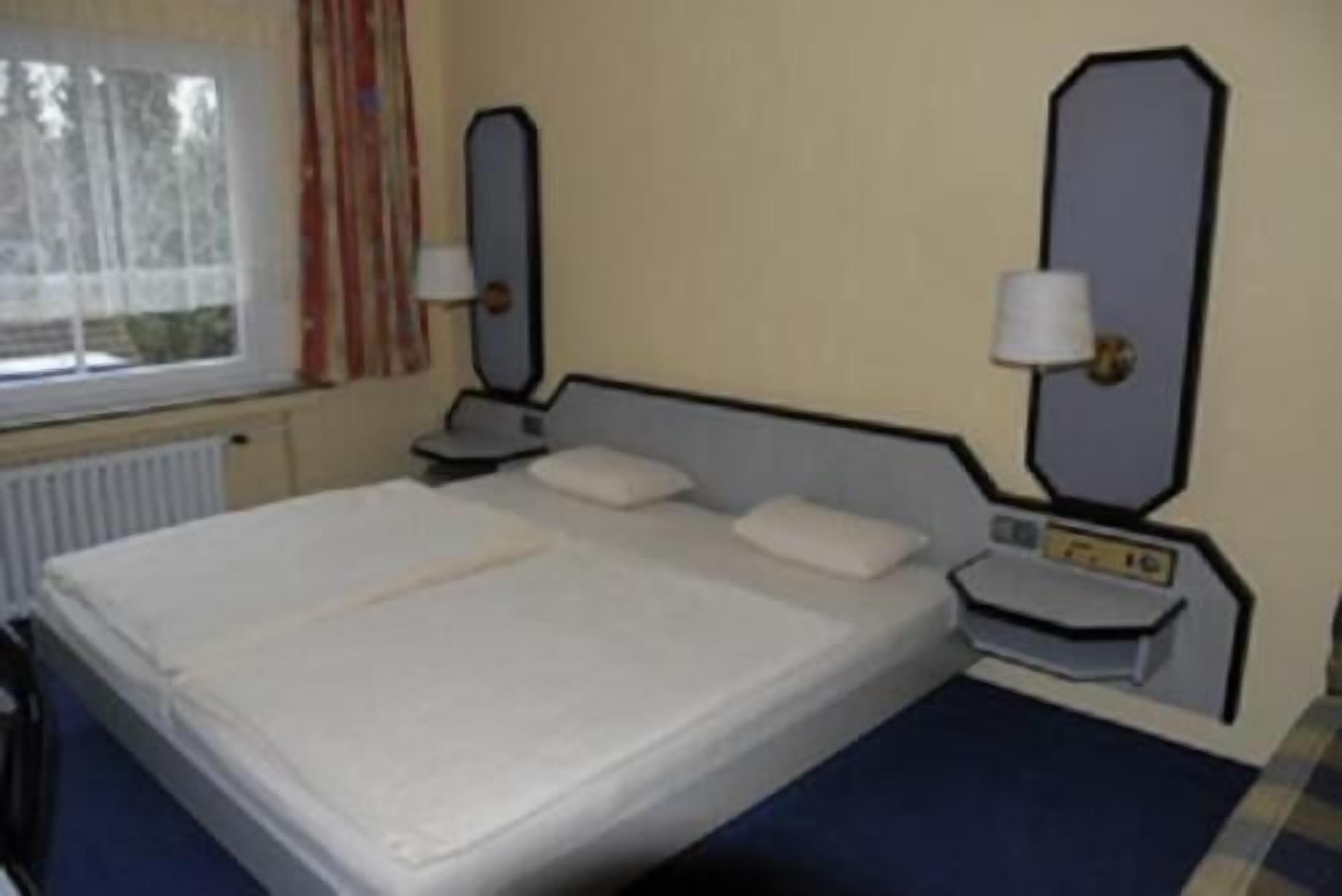 desk, blackout curtains, free wifi, bed sheets