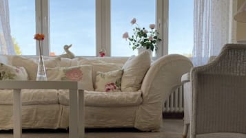 Family Suite (Main building) | Living area | 28-inch flat-screen TV with cable channels, toys, offices