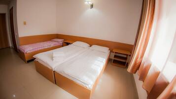 Family Room | Minibar, in-room safe, desk, iron/ironing board