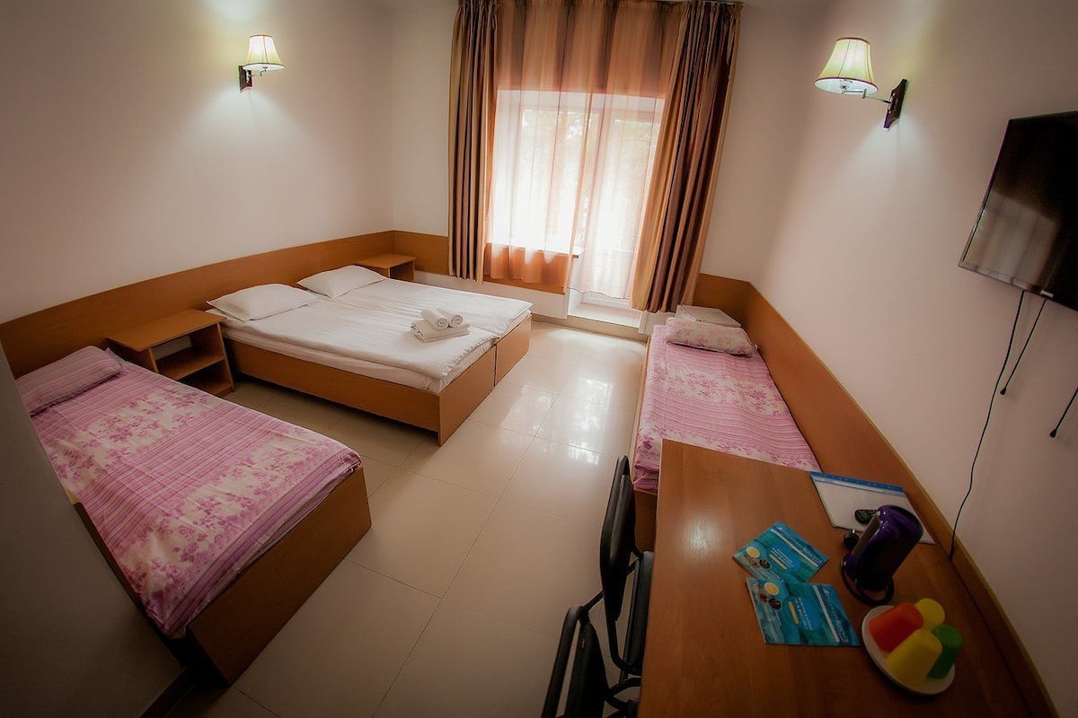 Family Room | Minibar, in-room safe, desk, iron/ironing board