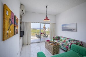 Apartment, 2 Bedrooms, Sea View | Living area | Flat-screen TV - Protaras Coral Seaview Suite (Paralimni)