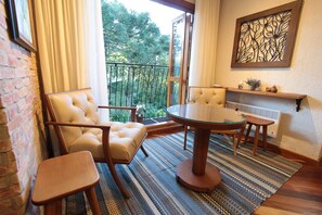 Apartamento, para não fumantes | Área de estar | Smart TV, lareira, Netflix