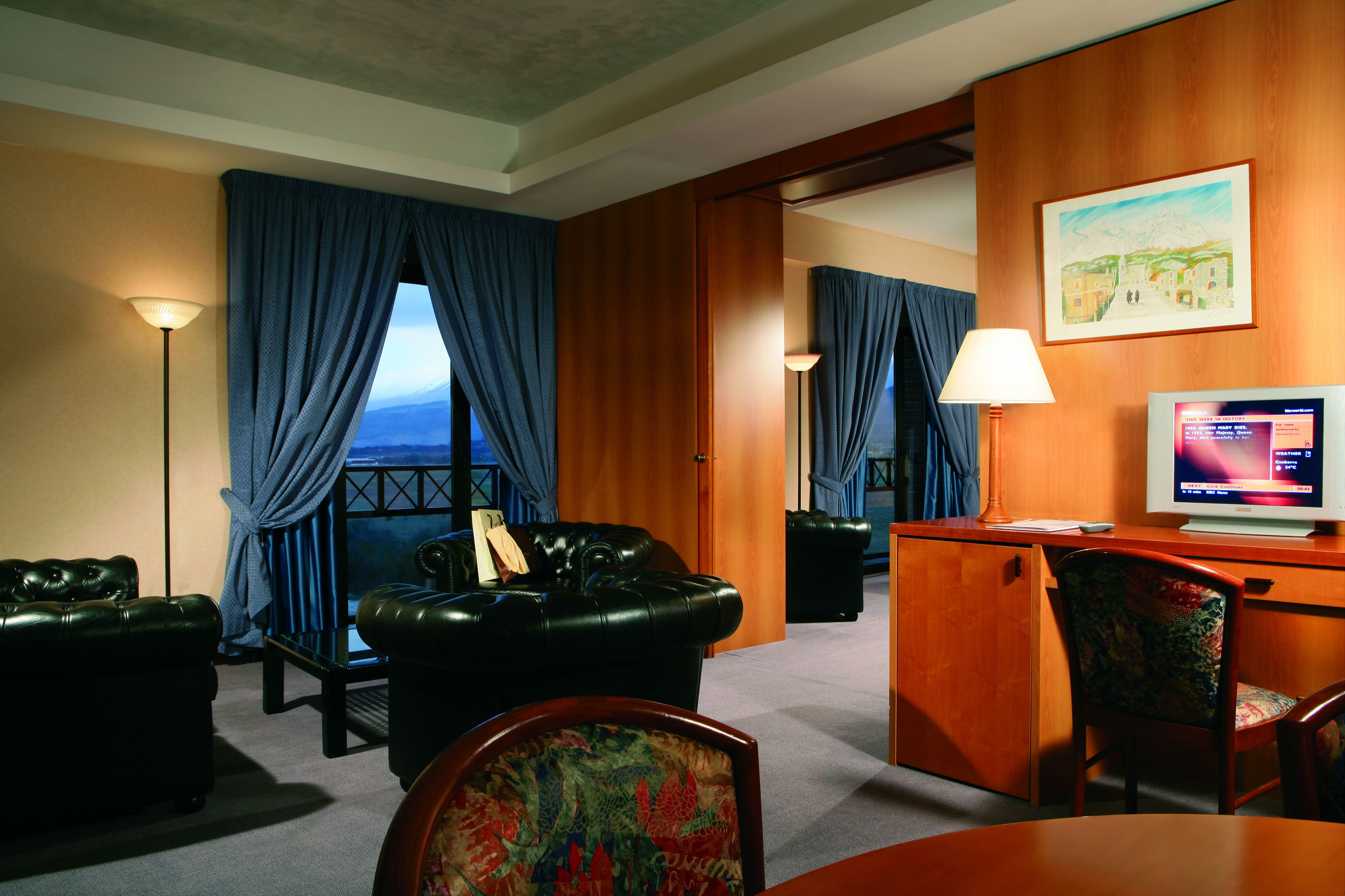 Junior Suite | Living area | Flat-screen TV