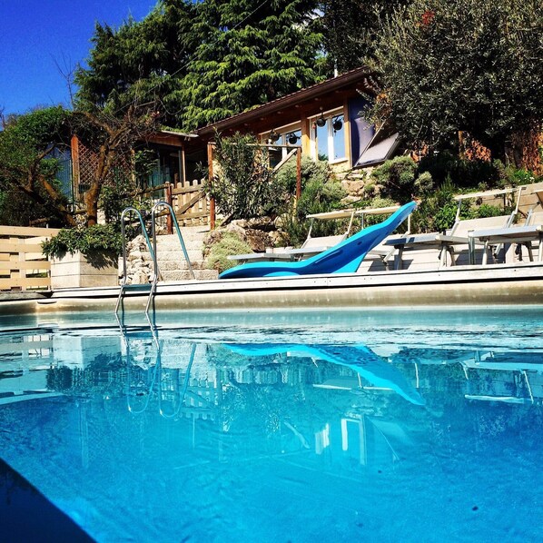 Outdoor pool, pool umbrellas, pool loungers
