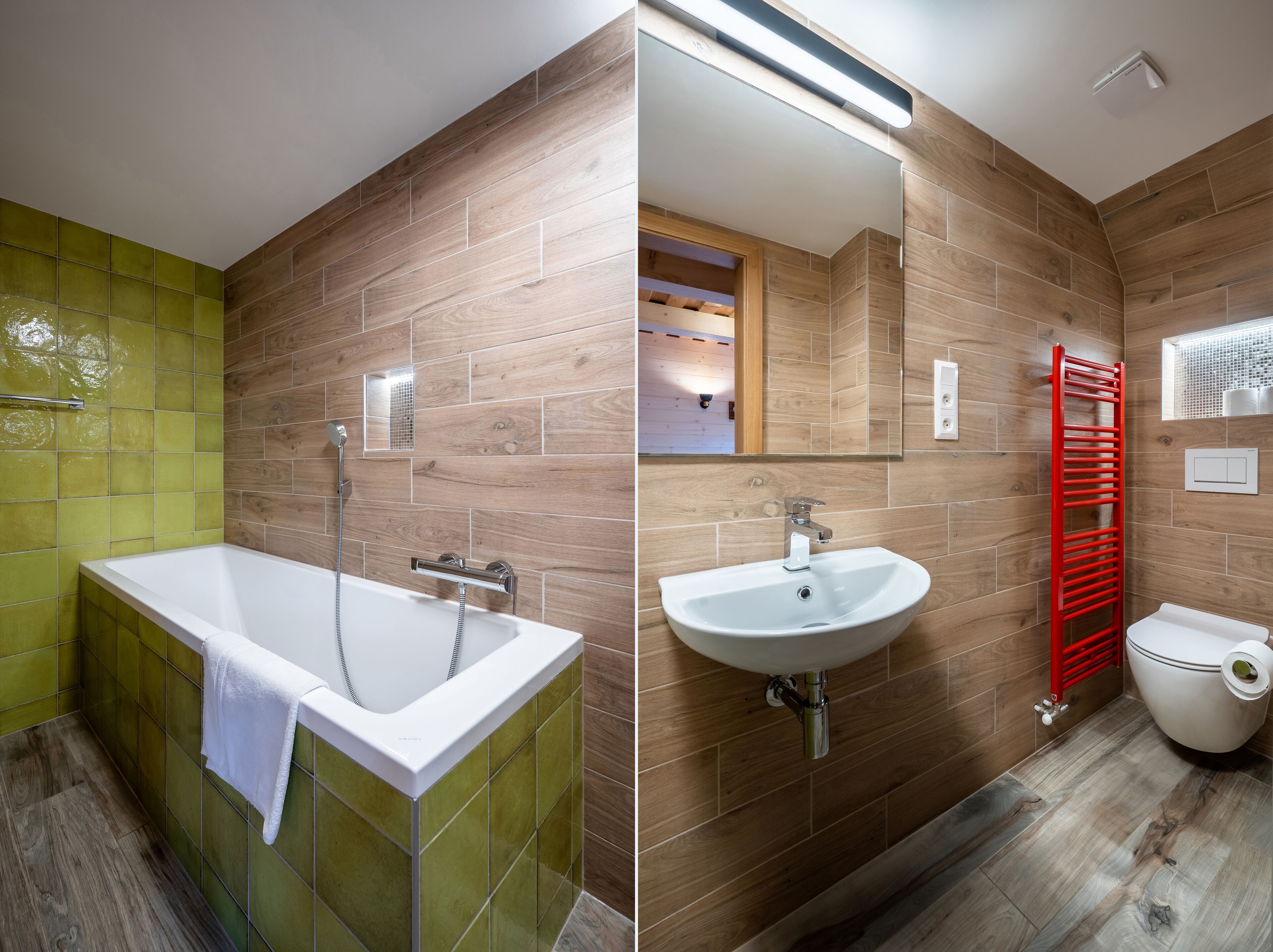 A modern bathroom with a bathtub, sink, and toilet.