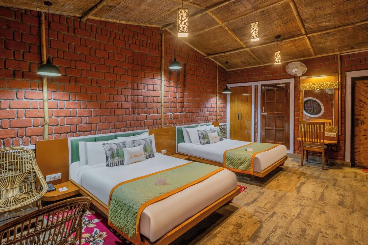 Family Room | Minibar, in-room safe, free WiFi, bed sheets