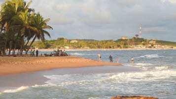 On the beach, sun-loungers, beach umbrellas