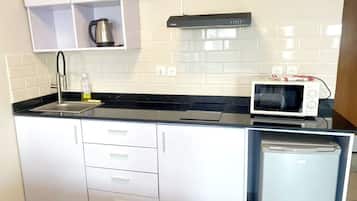Habitació doble prèmium | Cuina privada | Frigorífic, microones, congelador i tovallons de paper