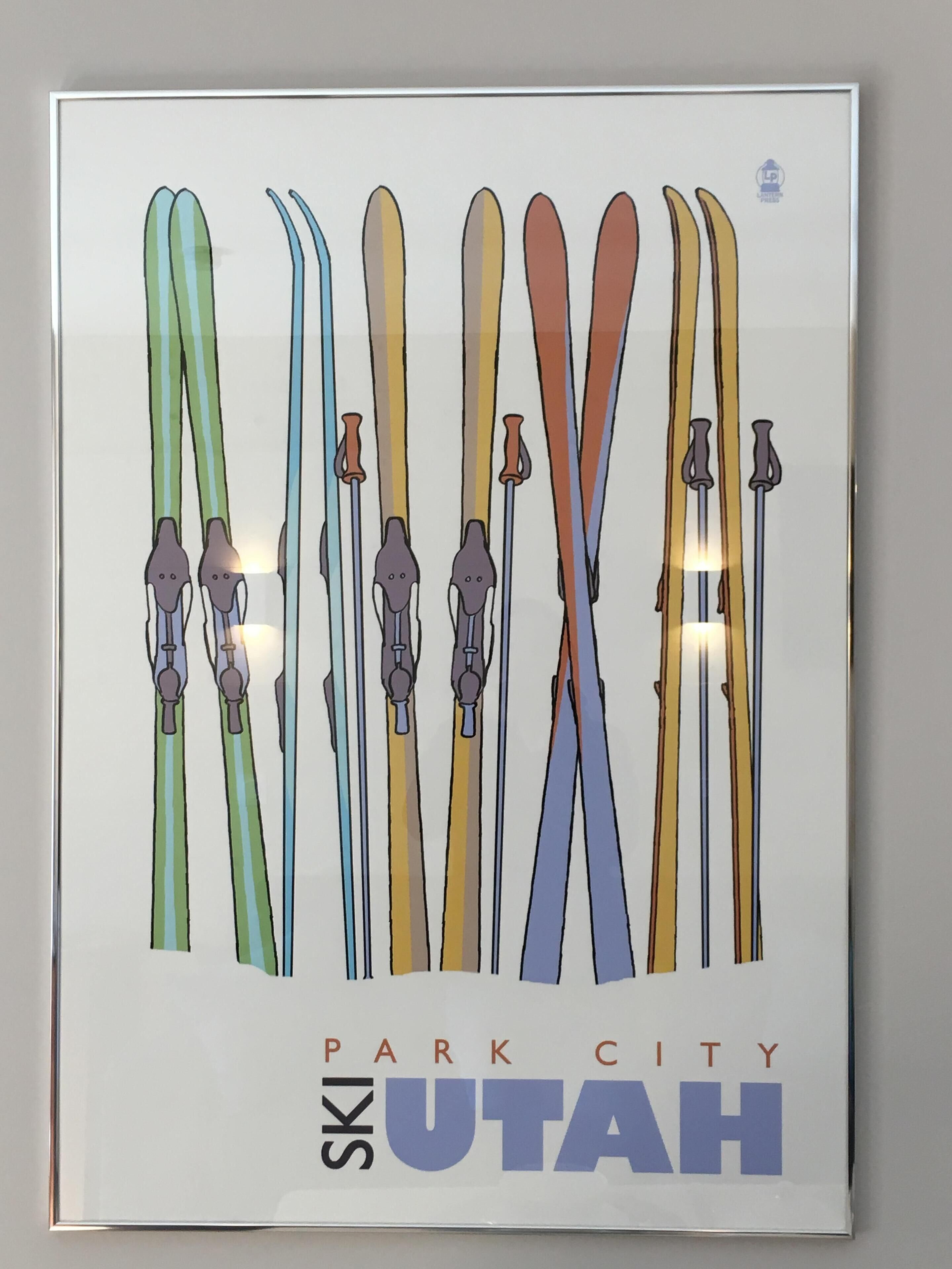 Um cartaz de esquis com o texto 'Park City Utah'.