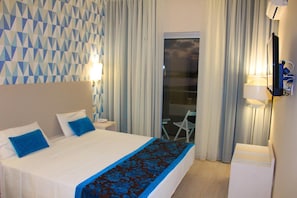 Minibar, desk, blackout curtains, bed sheets