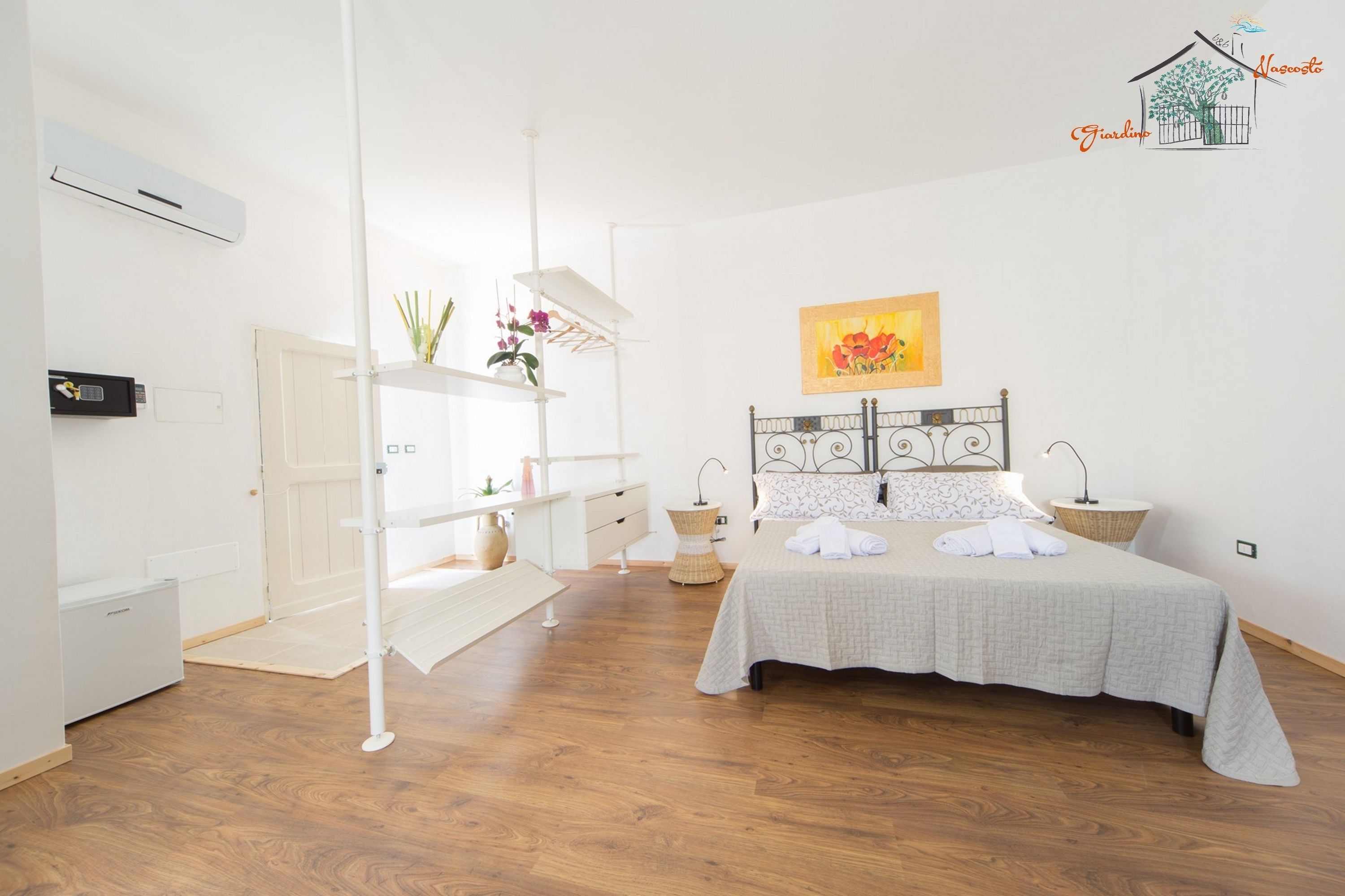 Doppelzimmer, Terrasse, Gartenblick (Kapok) | Minibar, Zimmersafe, individuell dekoriert, Verdunkelungsvorhänge