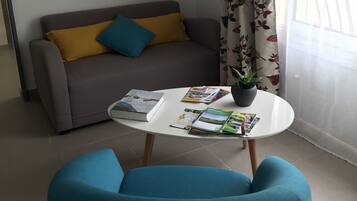 Double Room | Living area | Flat-screen TV