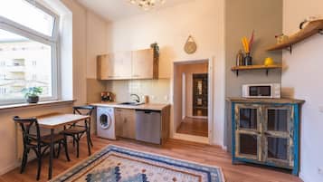 Deluxe Apartment, 1 Bedroom | Private kitchen | Full-size fridge, oven, stovetop, coffee/tea maker