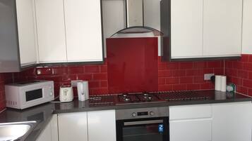 Microwave, coffee/tea maker, cookware/dishes/utensils