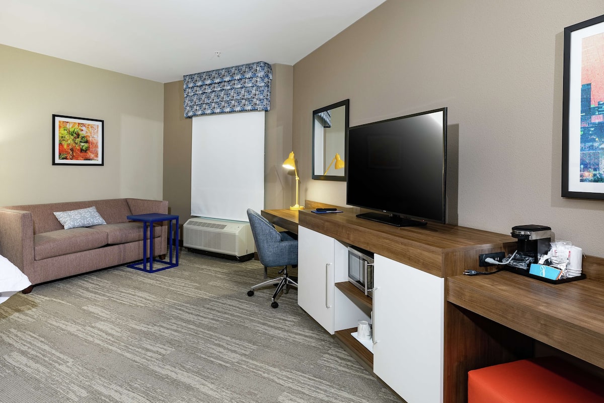 Room, 1 King Bed with Sofa bed, Refrigerator & Microwave | In-room safe, desk, laptop workspace, blackout drapes
