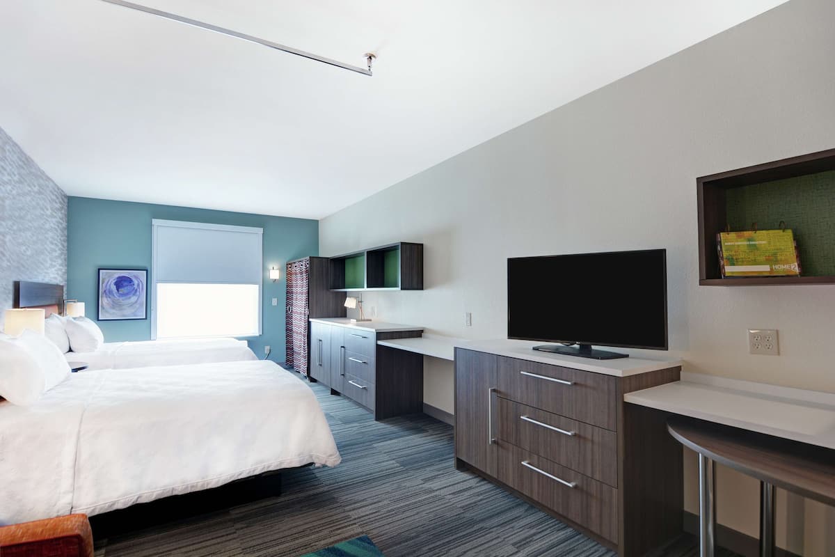 desk, laptop workspace, blackout curtains, iron/ironing board