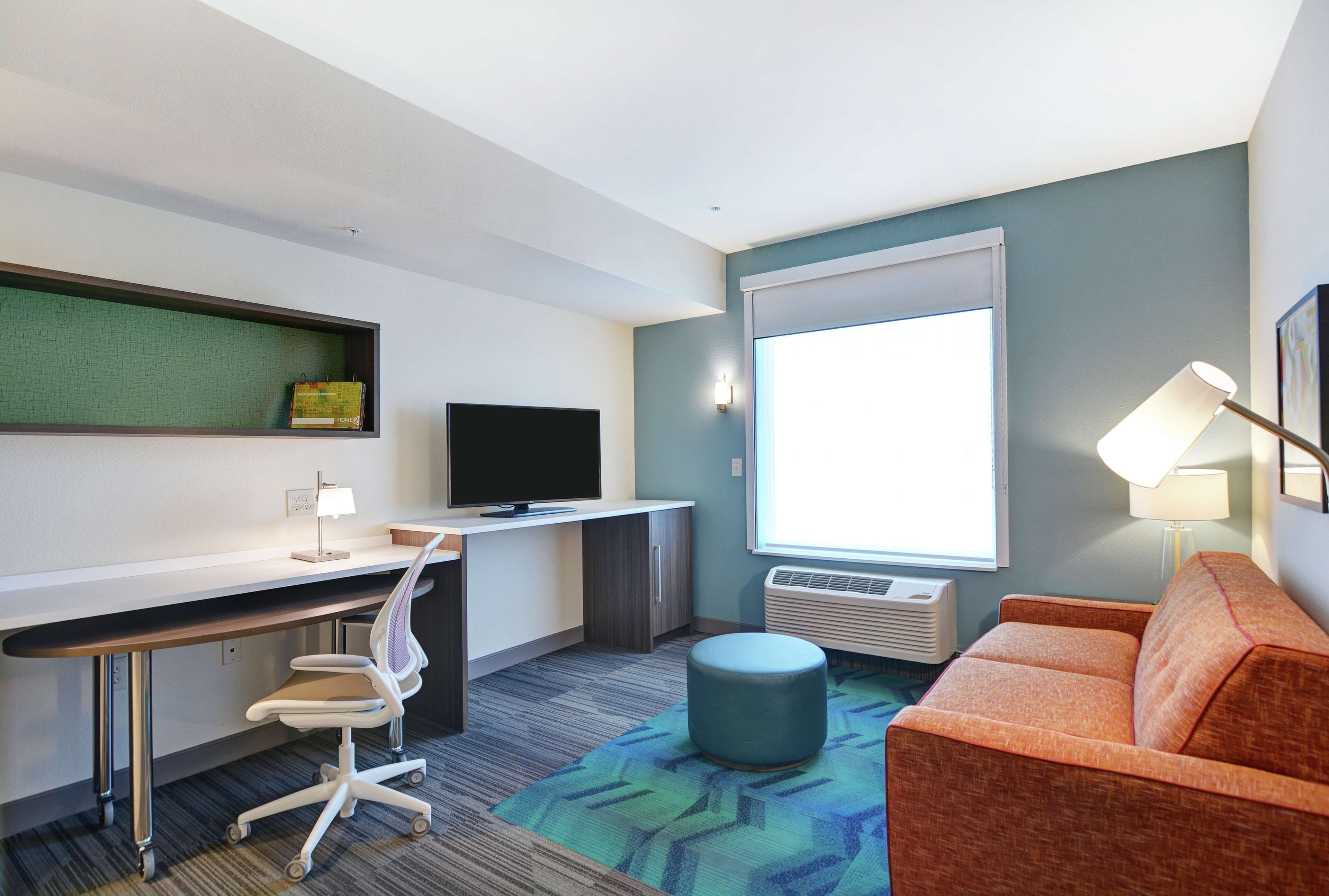 desk, laptop workspace, blackout curtains, iron/ironing board