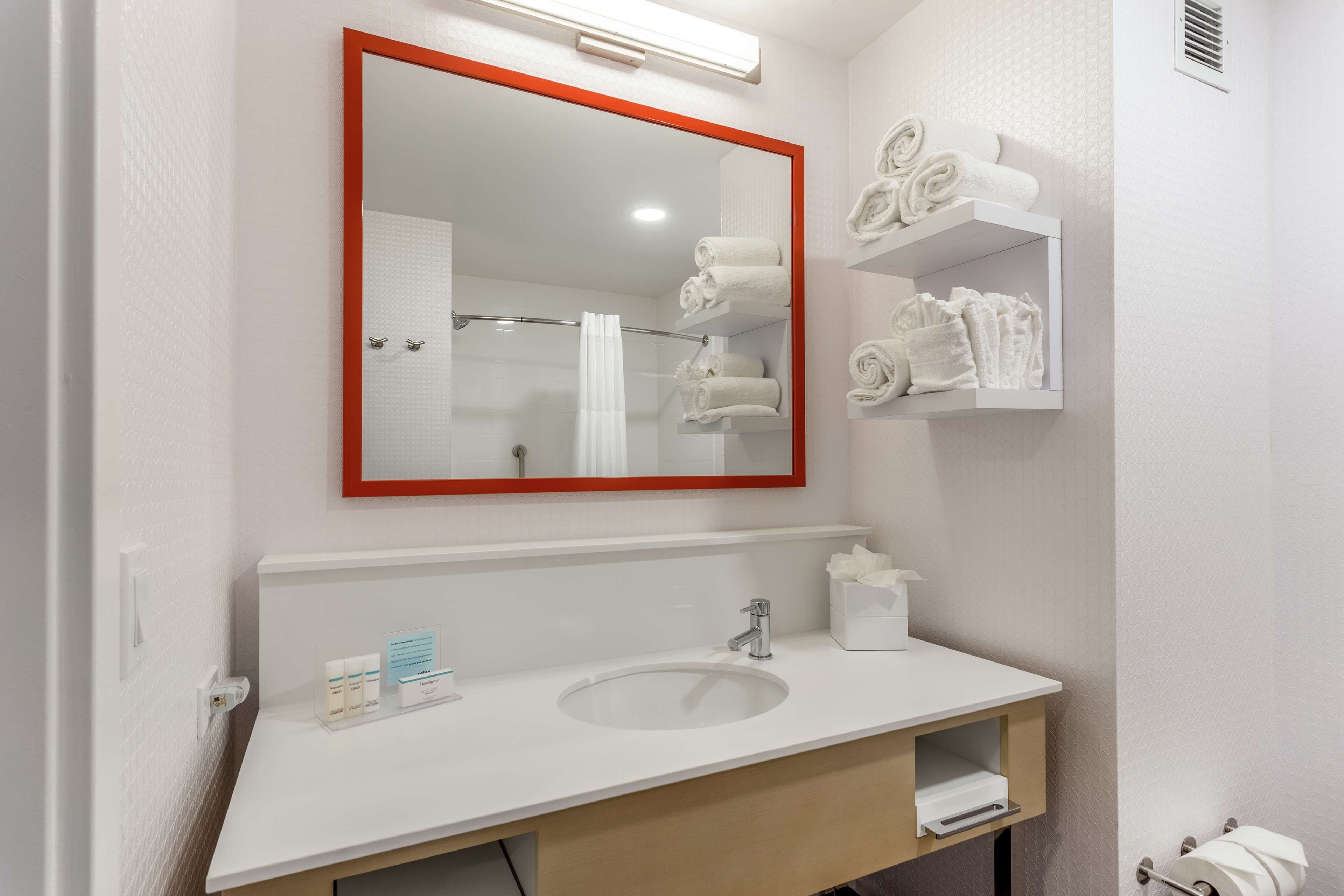 shower, free toiletries, hair dryer, towels