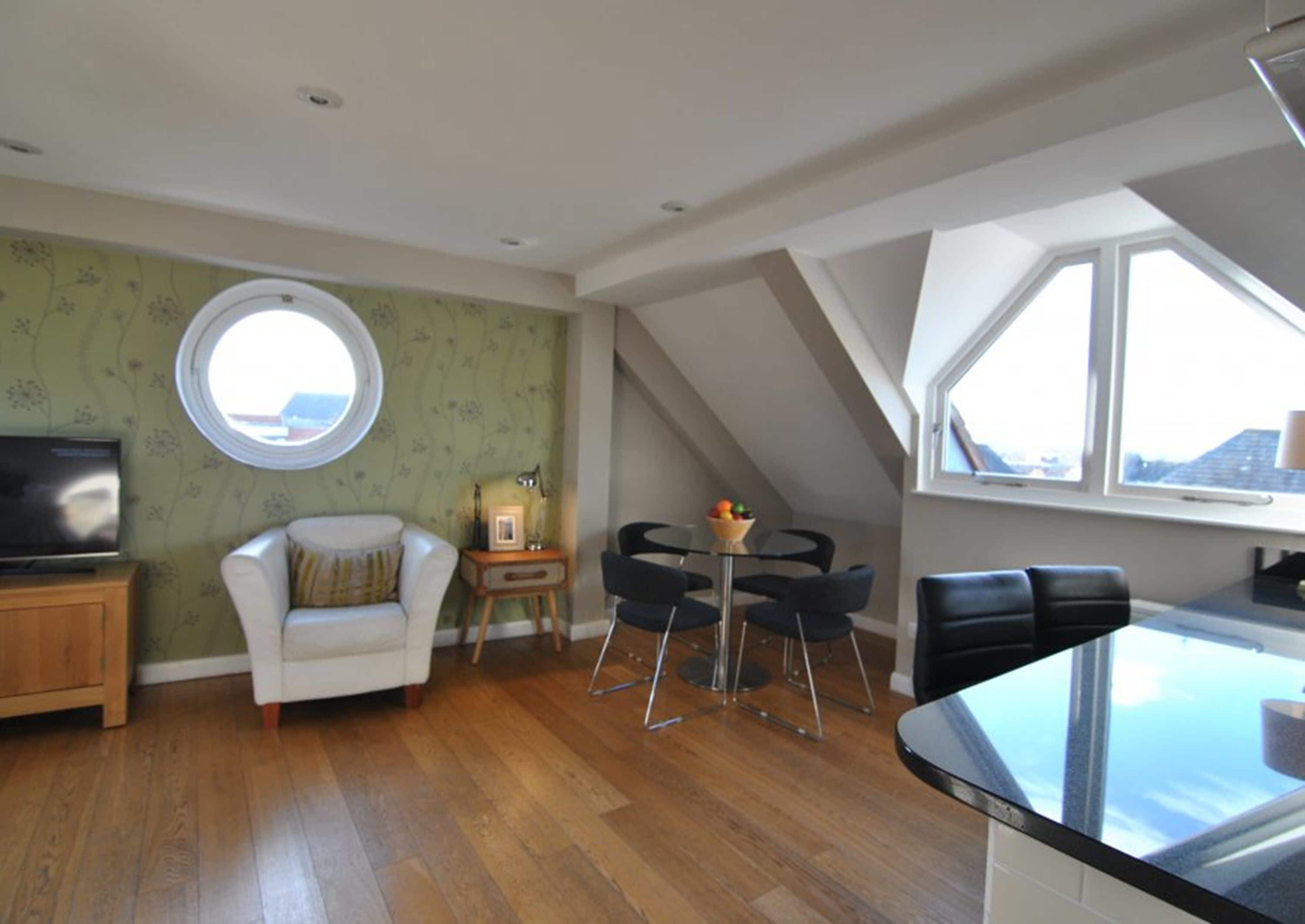 Executive Penthouse, 2 Bedrooms | Living area | Flat-screen TV, DVD player