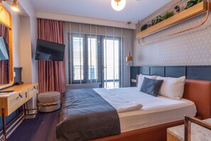 Habitación Deluxe | Minibar, escritorio, sistema de insonorización