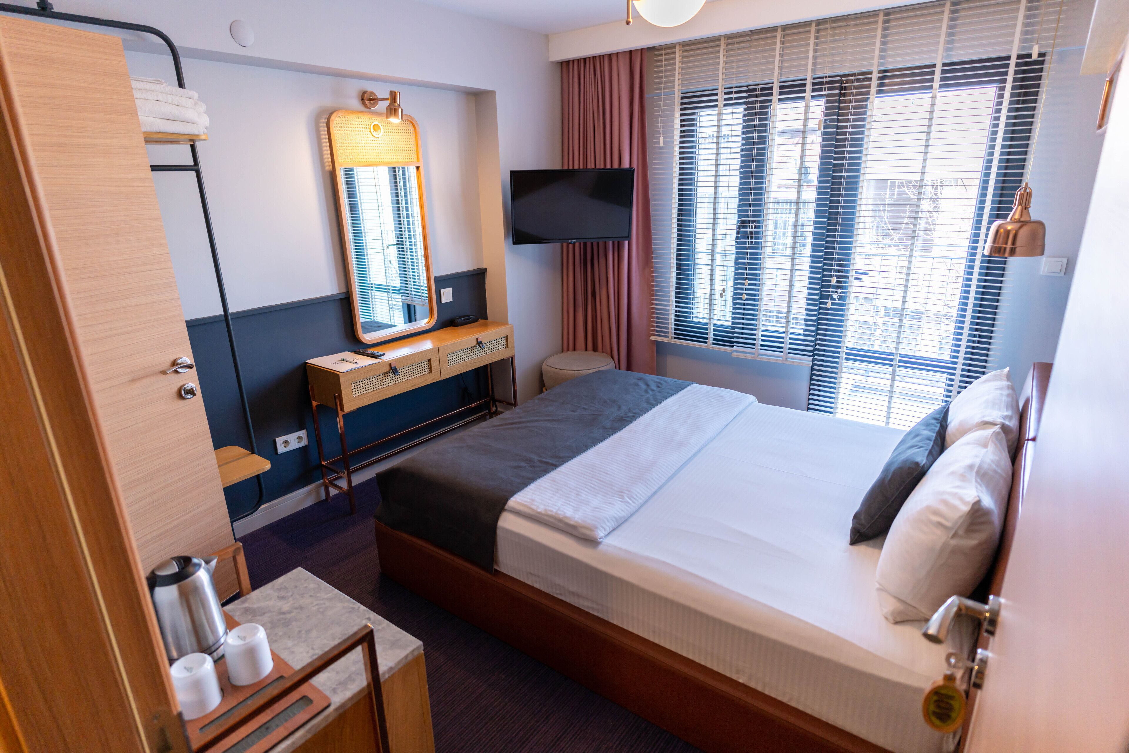 deluxe room | minibar, desk, soundproofing, iron/ironing board