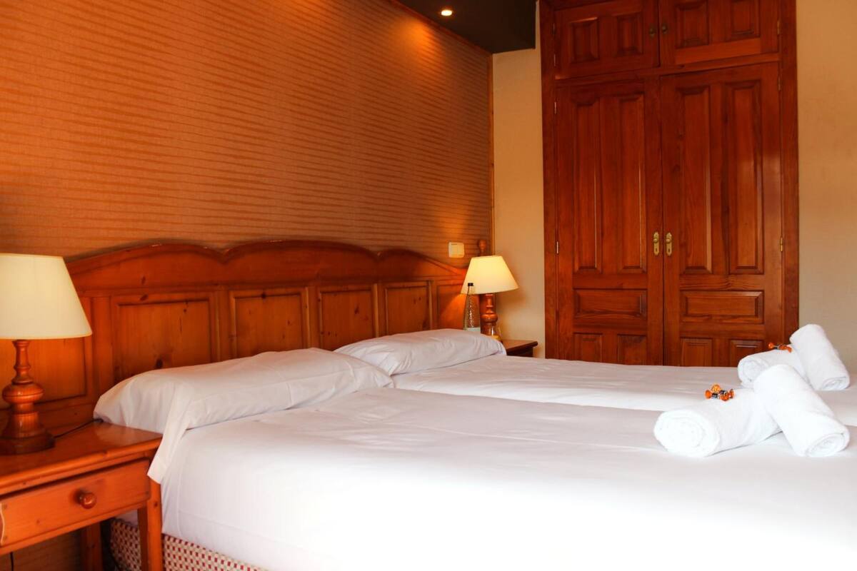 blackout curtains, iron/ironing board, bed sheets