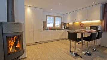Superior Chalet ("Flamma" with Private Sauna) | Private kitchen | Full-sized fridge, microwave, oven, stovetop