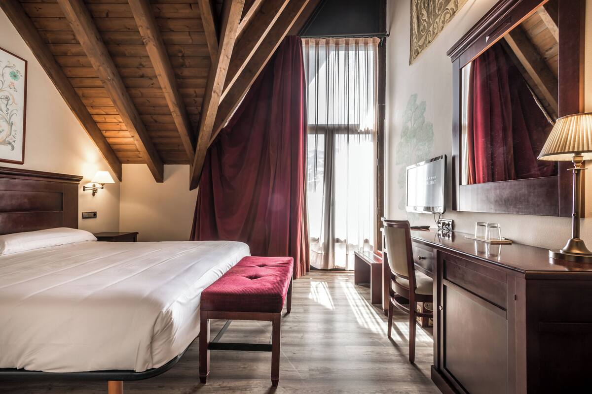 In-room safe, blackout curtains, iron/ironing board, bed sheets