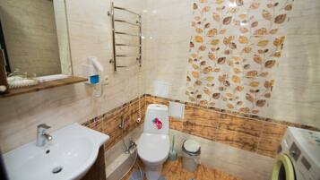 Hair dryer, slippers, towels