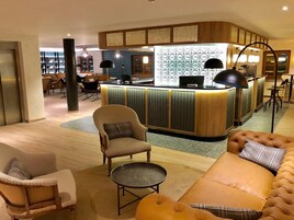 30-inch flat-screen TV with satellite channels, TV