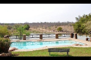 4 outdoor pools, pool cabanas (surcharge), pool umbrellas