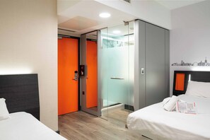 Family Room (No Windows) | Memory-foam beds, soundproofing, iron/ironing board, free WiFi