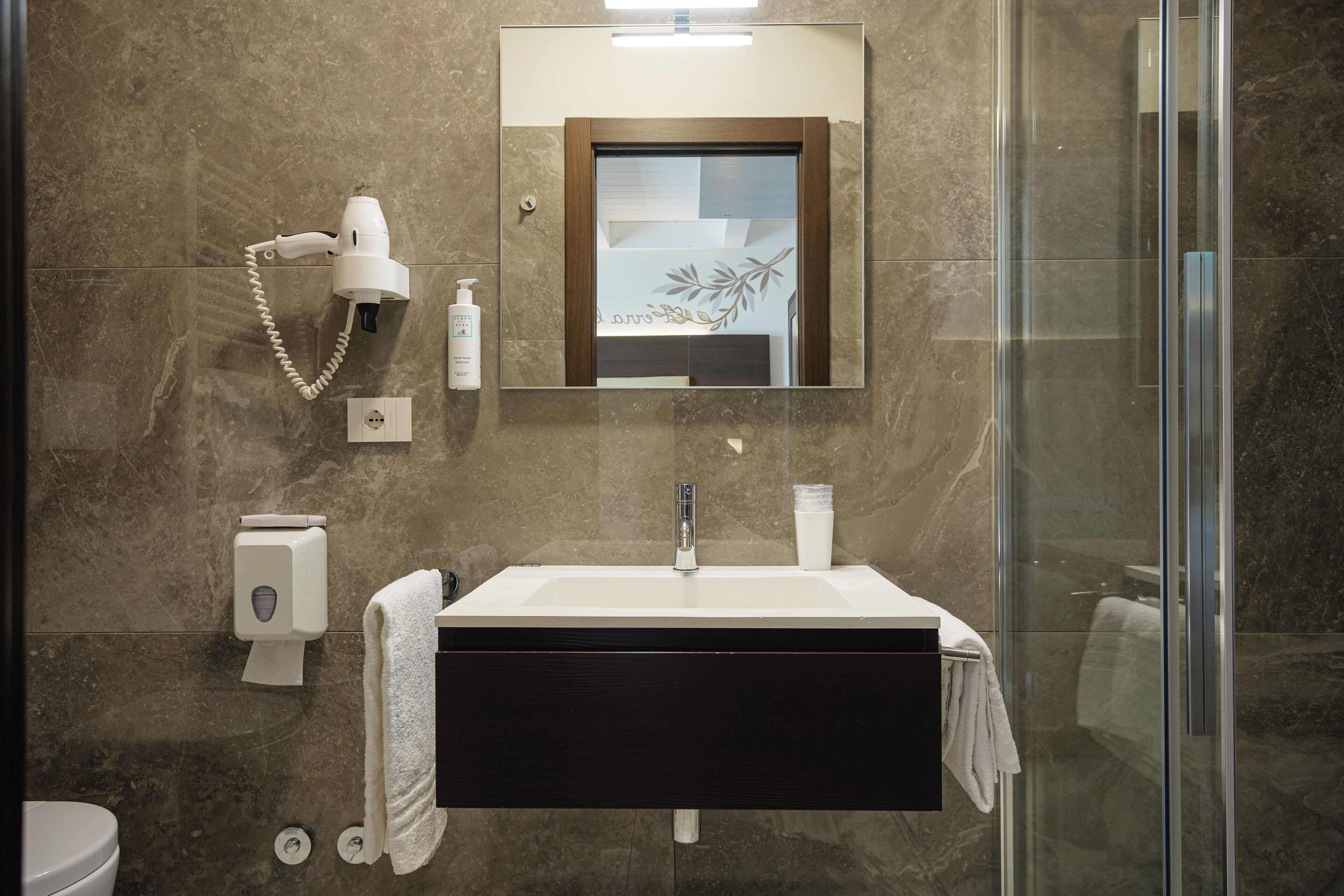 superior quadruple room | bathroom | shower, free toiletries, hair dryer, bidet